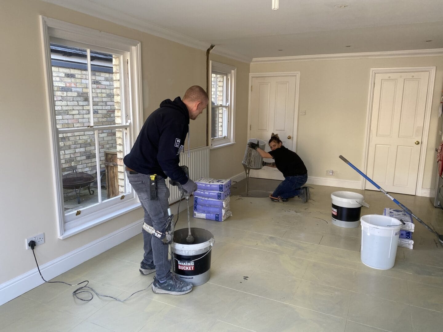 Subfloor preparation and levelling before flooring installation in Cambridge