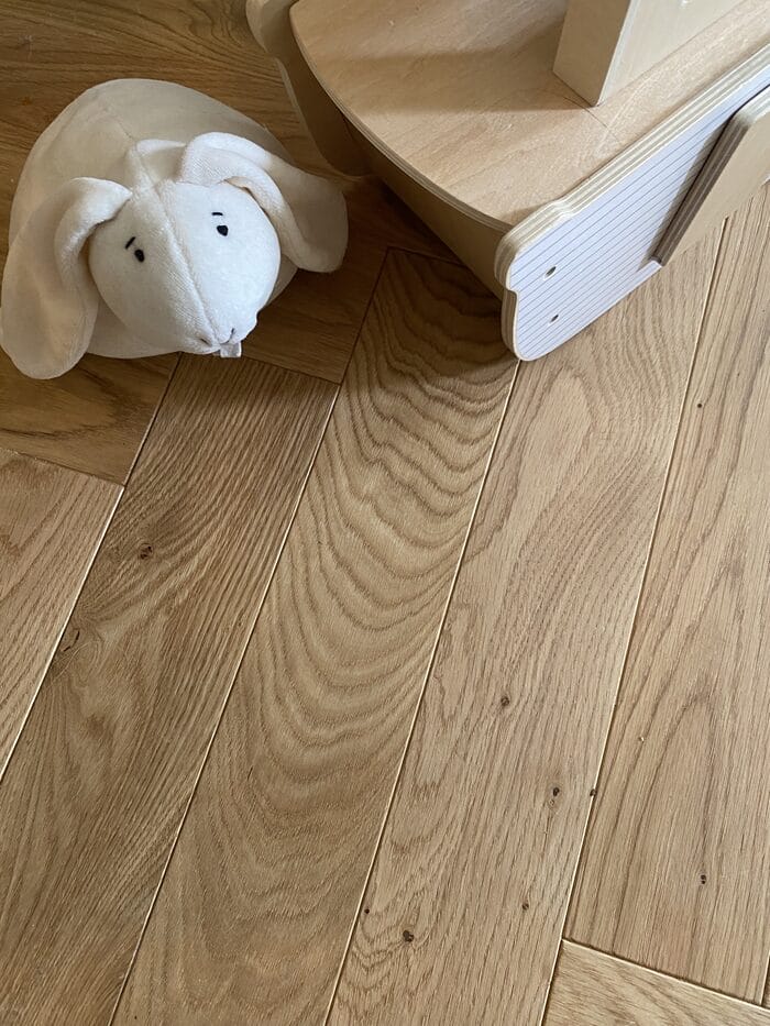 Engineered oak flooring detail in a family room with children’s toys in Cambridge