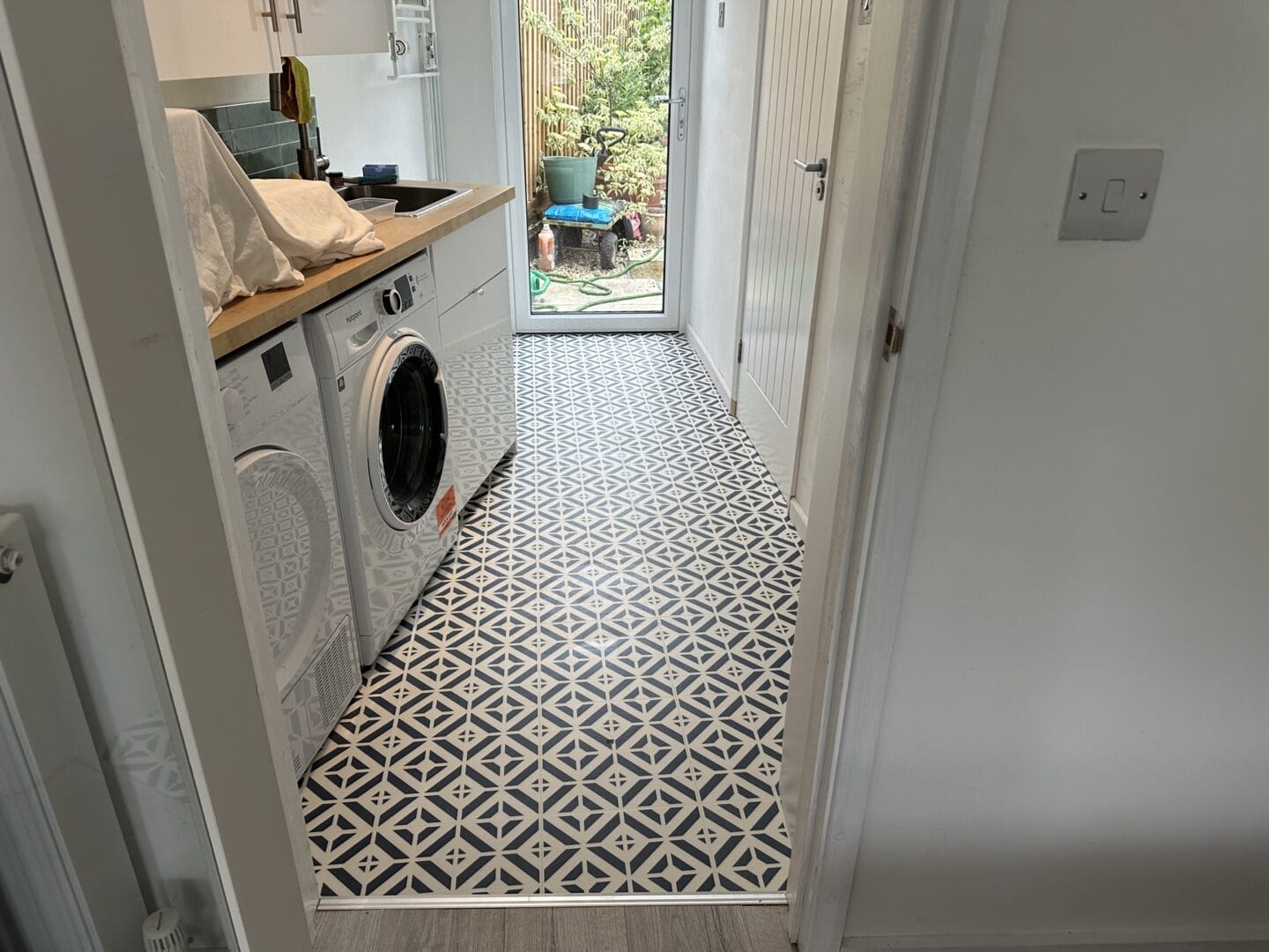 Completed Harvey Maria Aubrey flooring installation in a utility room in Haslingfield.
