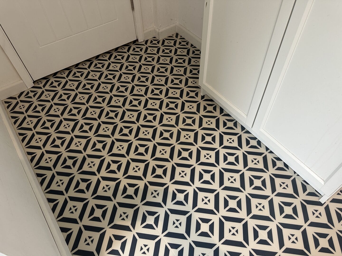 Harvey Maria Aubrey patterned flooring installed in a downstairs cloakroom WC in Haslingfield.