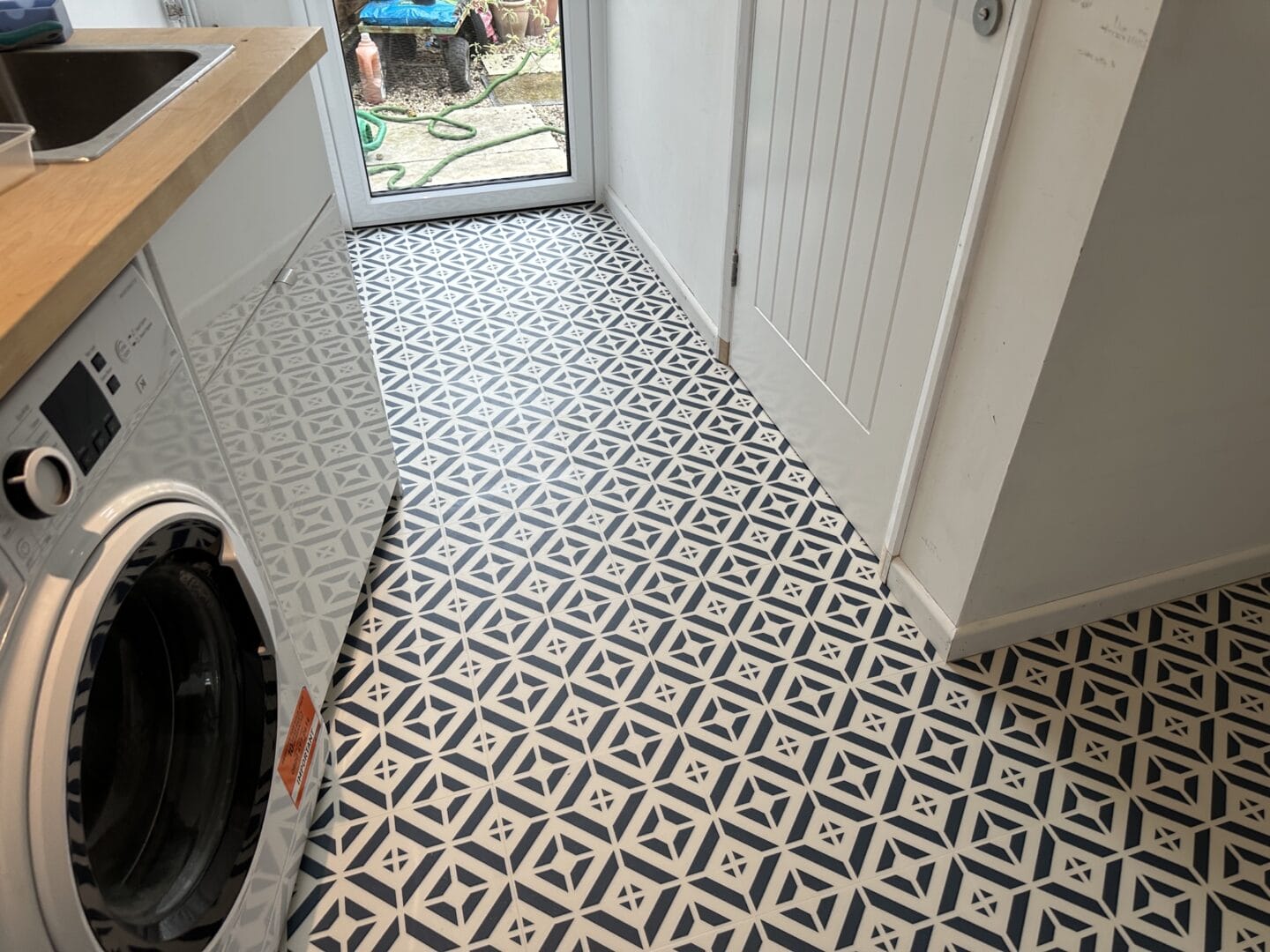 Harvey Maria Aubrey patterned flooring installed in a utility room in Haslingfield.