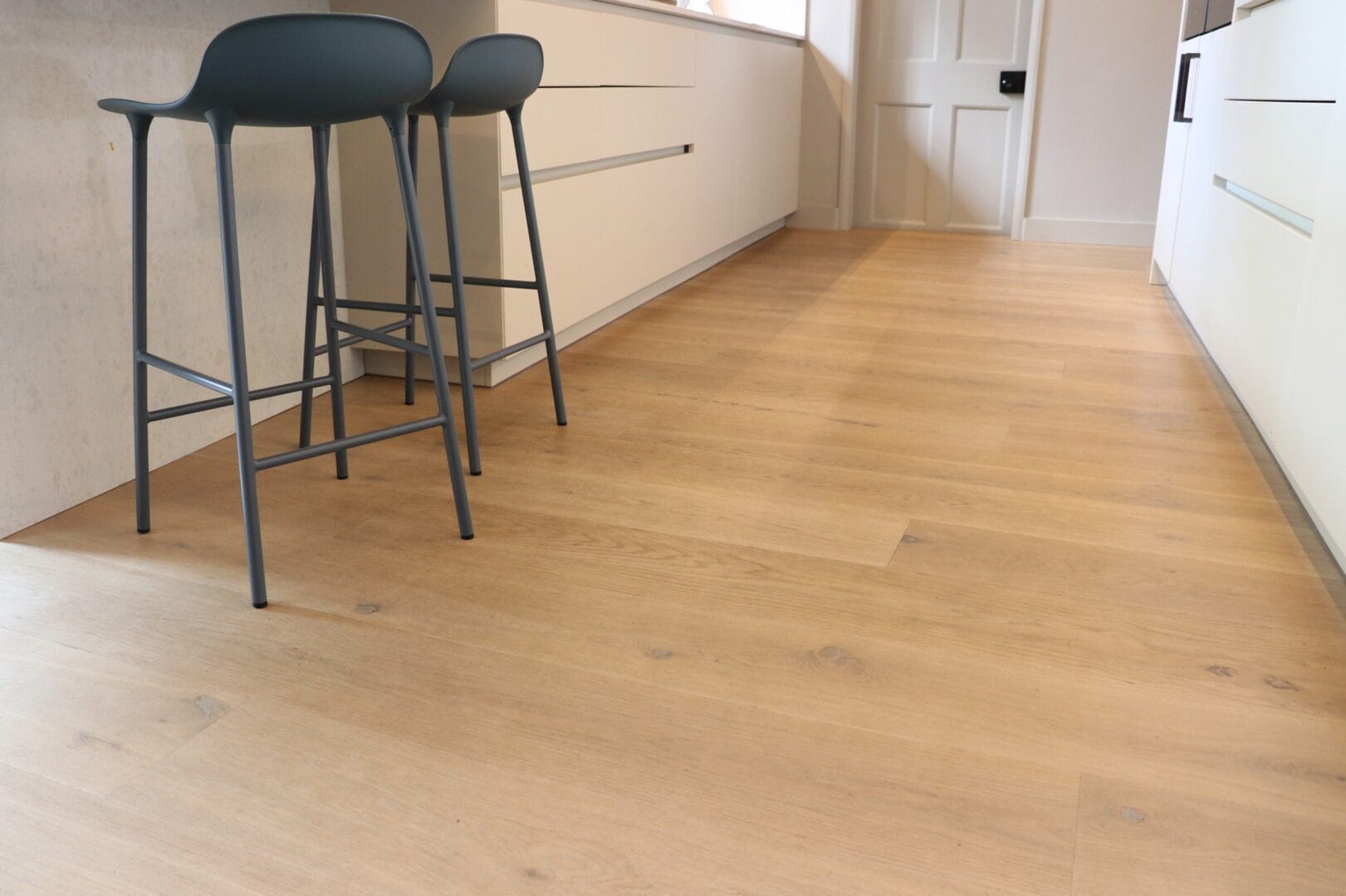 Kitchen bar stools on newly finished oak floor in Cambridge