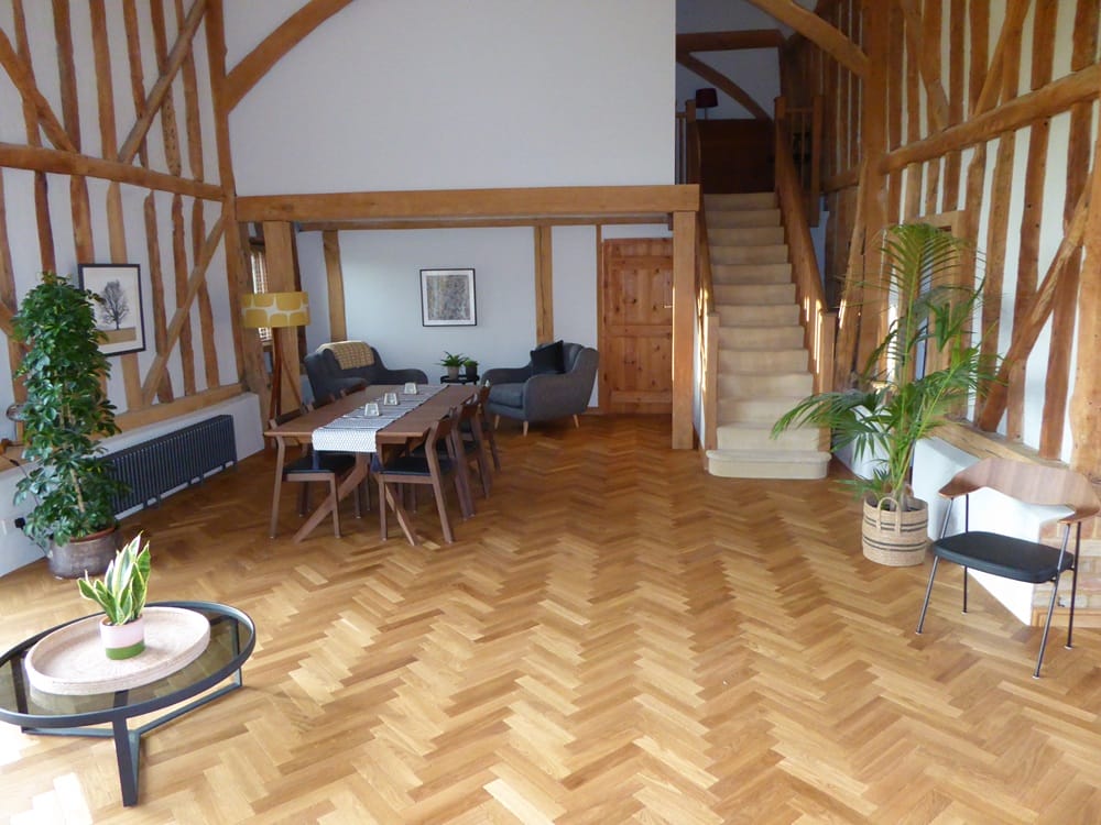 Engineered oak herringbone flooring installed in a character property near Cambridge.